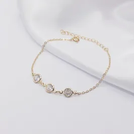 PULSEIRA DOURADA COM TRIPLO PONTO DE LUZ CRISTAL