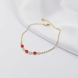 PULSEIRA DOURADA COM TRIPLO PONTO DE LUZ RUBI