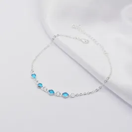 PULSEIRA PRATA COM QUATRO PONTOS DE LUZ AZUL
