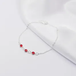 PULSEIRA PRATA COM TRIPLO PONTO DE LUZ RUBI