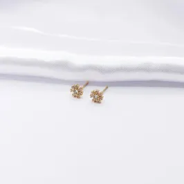 BRINCO DOURADO FLORZINHA EM ZIRCÔNIA