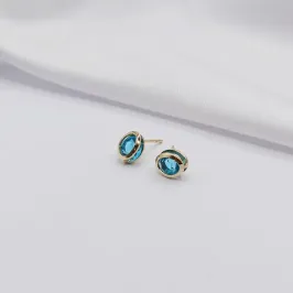 BRINCO DOURADO PONTO DE LUZ OVAL AZUL