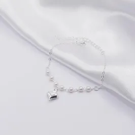 PULSEIRA PRATA COM PÉROLAS E PINGENTE CORAÇÃO