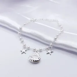 PULSEIRA PRATA ELO DE PÉROLA COM CONCHA E ESTRELA DO MAR
