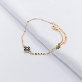 PULSEIRA DOURADA ELO OVAL COM TREVO BLACK