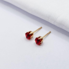 BRINCO DOURADO PONTO DE LUZ VERMELHO G