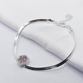 PULSEIRA PRATA FITA COM PINGENTE SEXTAVADO CRAVEJADO COLORIDO