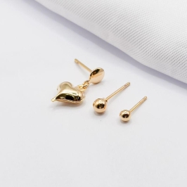 BRINCO DOURADO TRIO CORAÇÃO E BOLINHAS