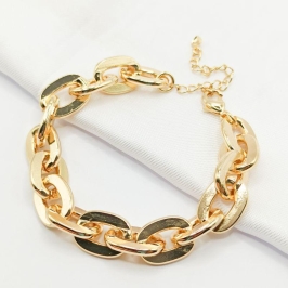 PULSEIRA DOURADA ELO CARTIER OVAL ACHATADO