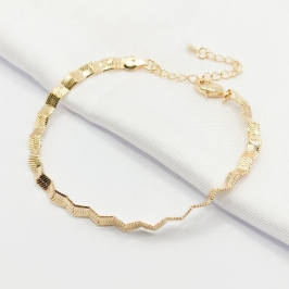 PULSEIRA DOURADA MALHA FITA ONDULADA