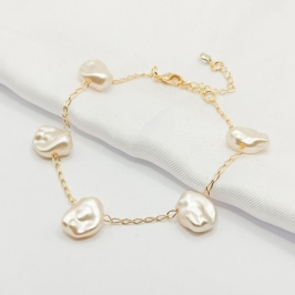 PULSEIRA DOURADA PÉROLAS BARROCAS