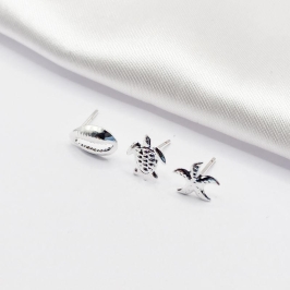 BRINCO PRATA TRIO BUZIOS TARTARUGA E ESTRELA DO MAR