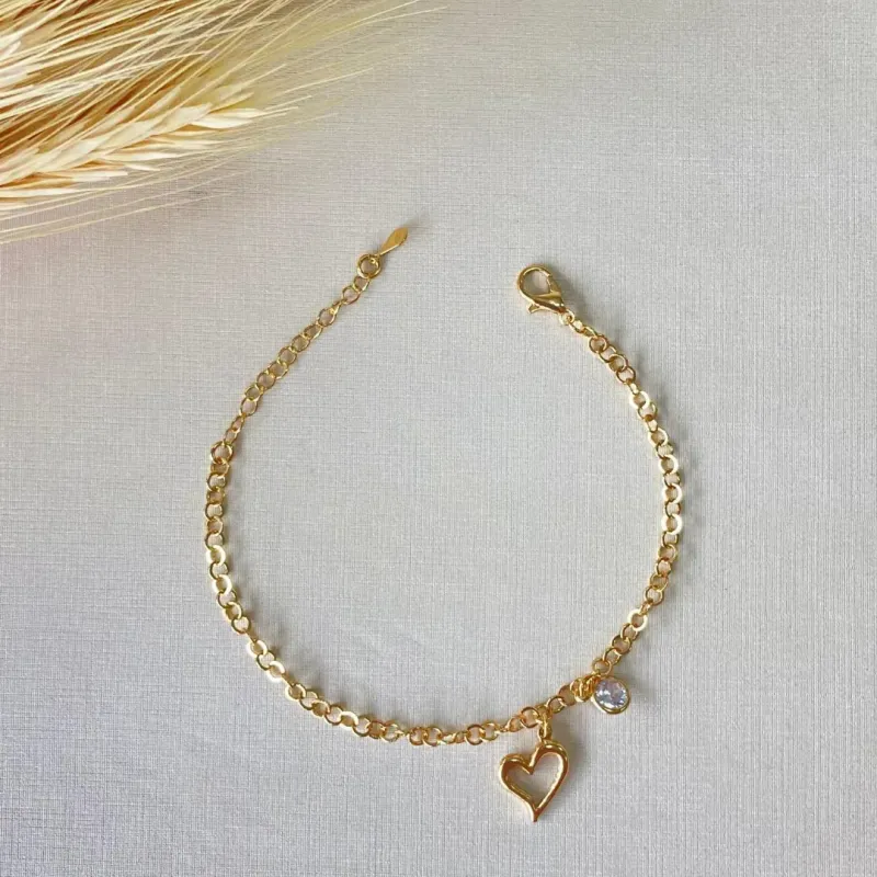 Pulseira Dourada Grume Coração Torto Zircônia