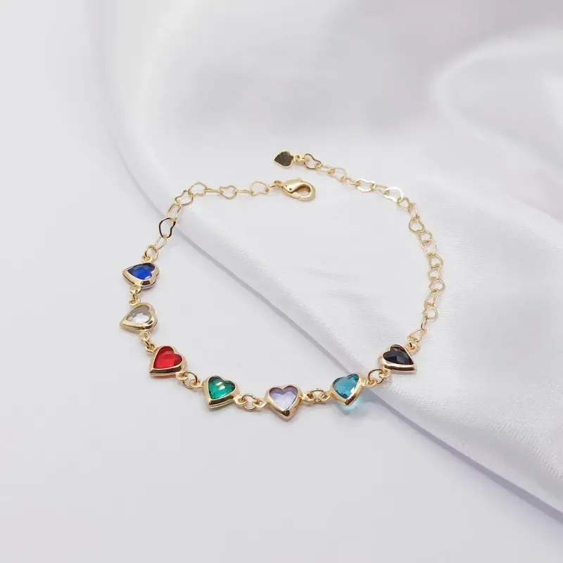 PULSEIRA DOURADA COM MÚLTIPLOS CORAÇÕES COLORIDOS