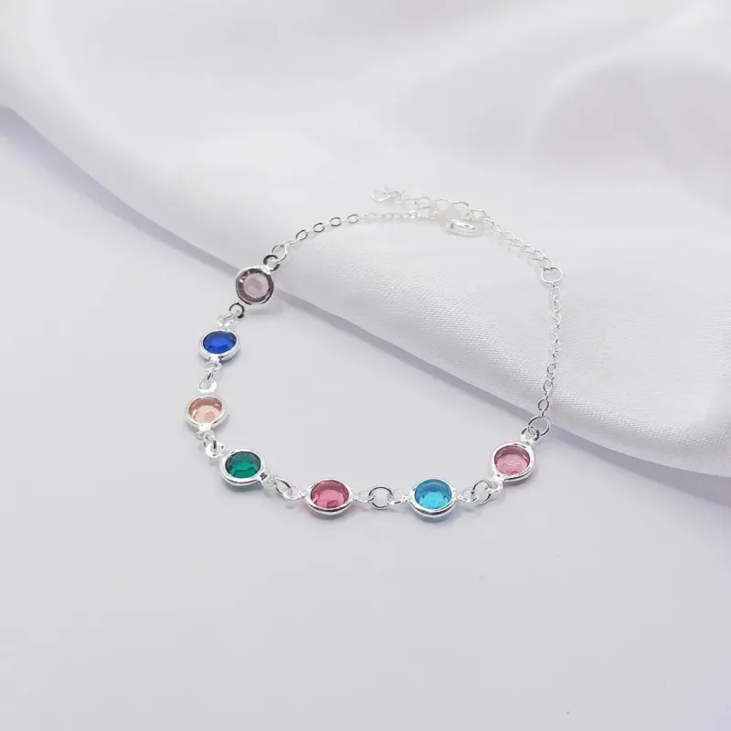 PULSEIRA PRATA COM MÚLTIPLOS PONTOS DE LUZ COLORIDOS