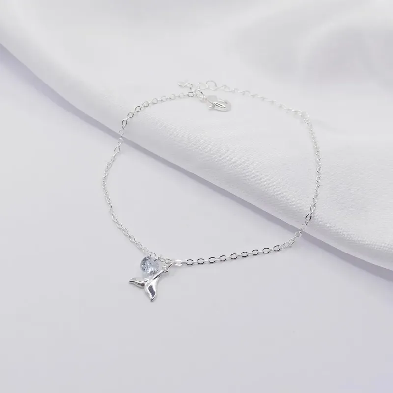 PULSEIRA PRATA COM PINGENTE CAUDA DE SEREIA E PONTO DE LUZ
