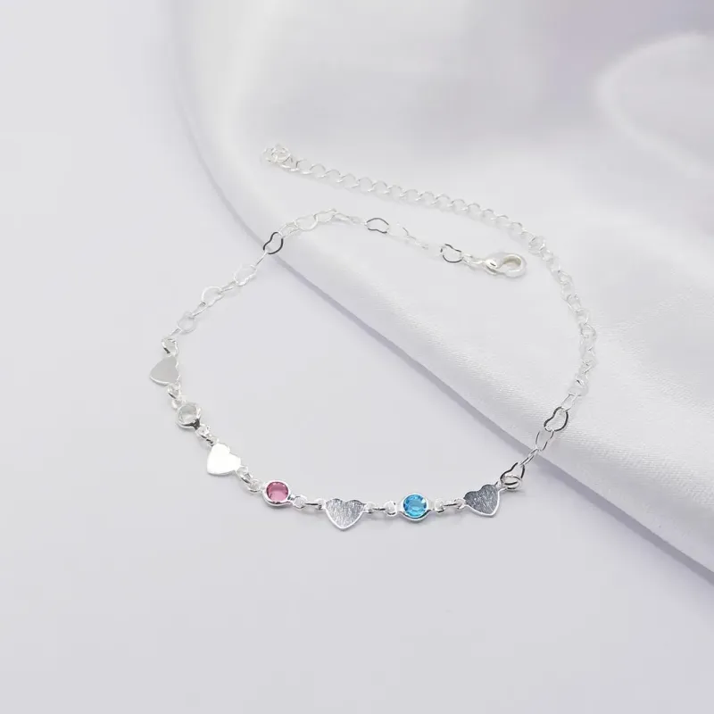 TORNOZELEIRA PRATA COM CORAÇÃO CHAPA E ZIRCÔNIA ROSA E AZUL