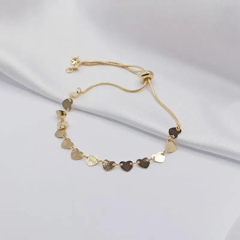 PULSEIRA DOURADA AJUSTÁVEL DE CORAÇÕES CHAPA