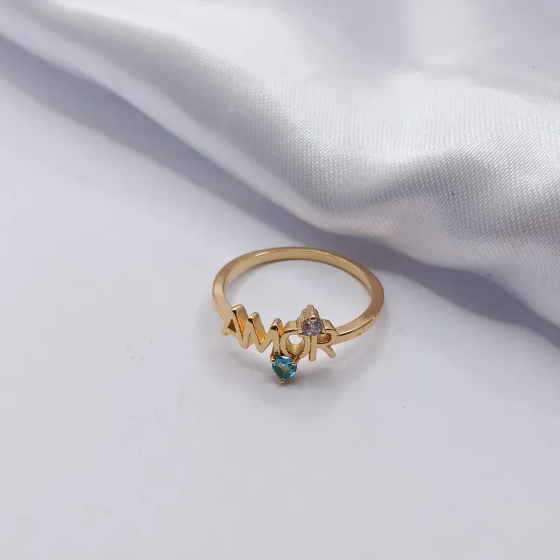 ANEL DOURADO AMOR COM PONTO DE LUZ CORAÇÃO AZUL