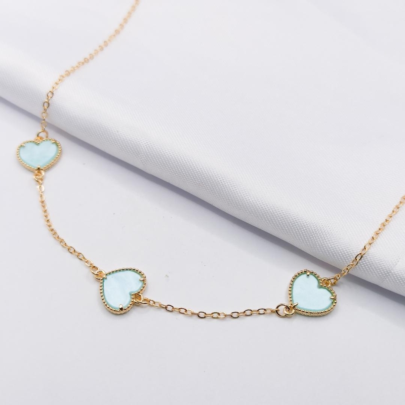 GARGANTILHA DOURADA CHOKER COM CORAÇÃO MADREPÉROLA AZUL 35CM
