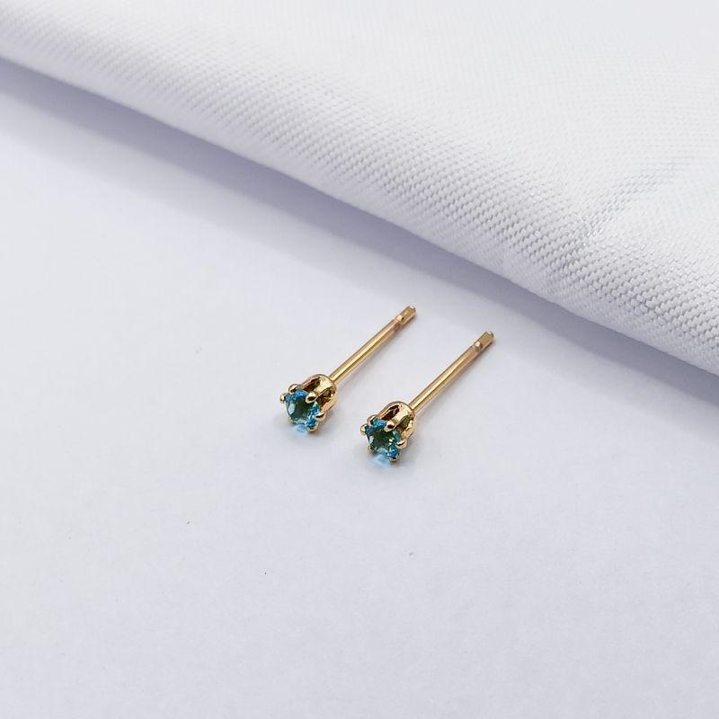 BRINCO DOURADO PONTO DE LUZ AZUL P