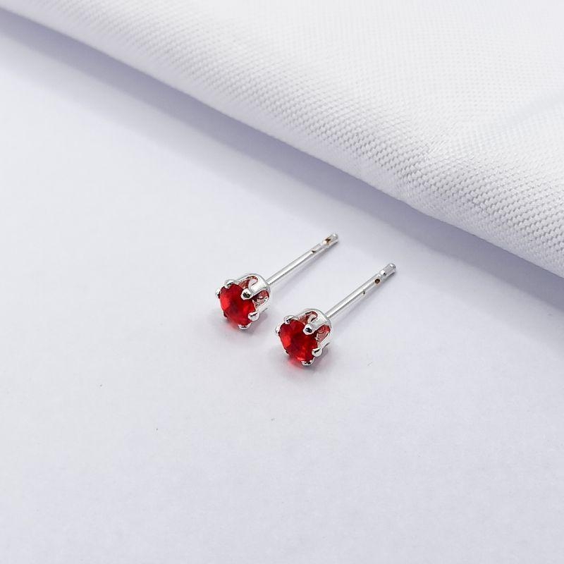 BRINCO PRATA PONTO DE LUZ VERMELHO M