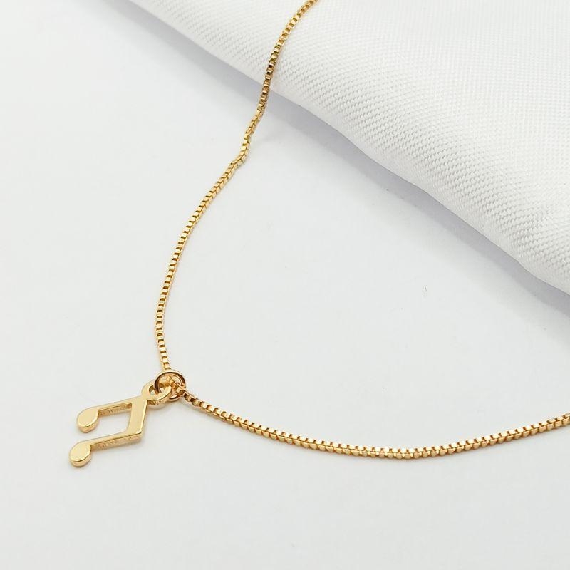 GARGANTILHA DOURADA CHOKER LETRA MUSICAL 40CM