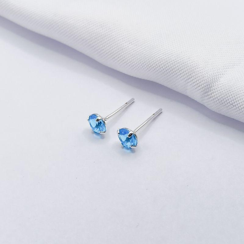 BRINCO PRATA PONTO DE LUZ AZUL M
