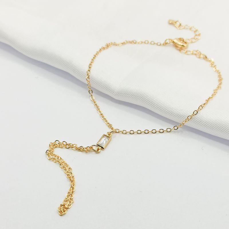 PULSEIRA DOURADA DE MÃO COM BAGUETE CRISTAL