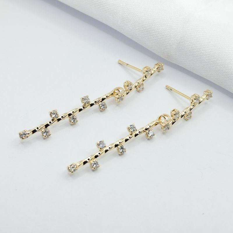 BRINCO DOURADO FIO TORCIDO COM ZIG ZAG DE ZIRCÔNIA