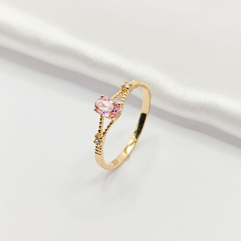 ANEL DOURADO CRISTAL OVAL ROSA E 2 ZIRCÔNIAS