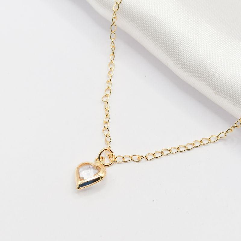 COLAR DOURADO CORAÇÃO PONTO DE LUZ CRISTAL 45CM