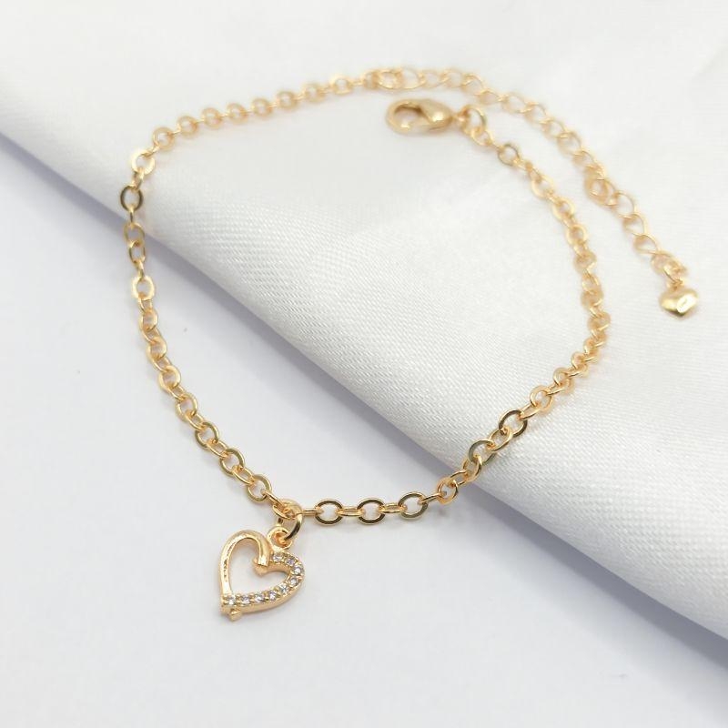 PULSEIRA DOURADA CORAÇÃO VAZADO MEIO CRAVEJADO