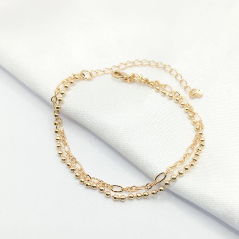 PULSEIRA DOURADA CORRENTE DUPLA BOLINHA E ELO CARTIER