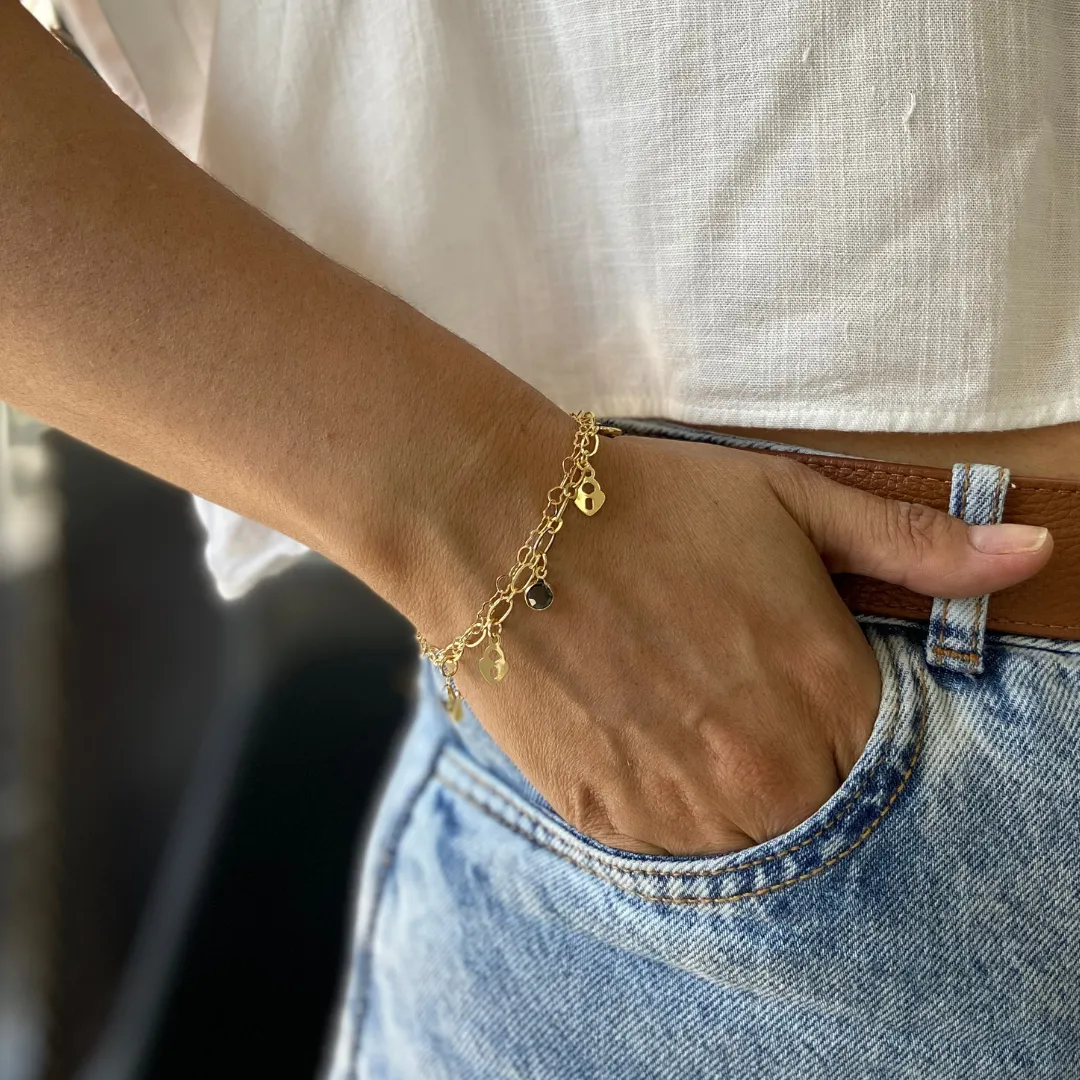 PULSEIRA DOURADO DUPLA ZIRCONIA FUME COM CORAÇÃO