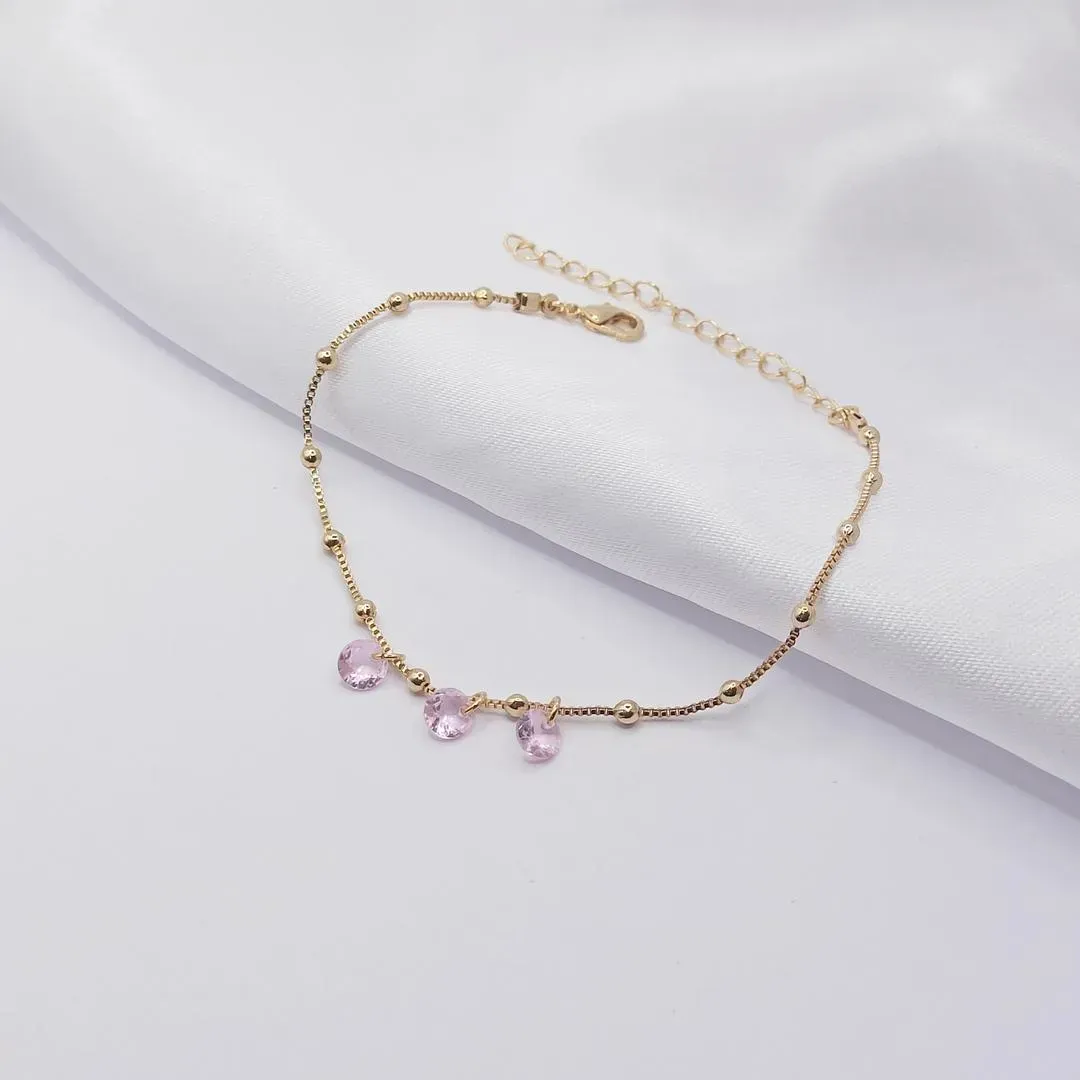 PULSEIRA DOURADA COM ABS INTERCALADO E TRIPLO PONTO DE LUZ ROSA