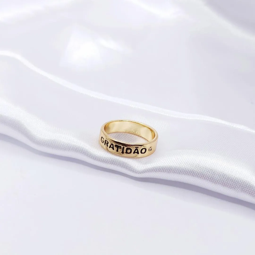 ANEL DOURADO GRATIDÃO COM MINI PONTO DE LUZ