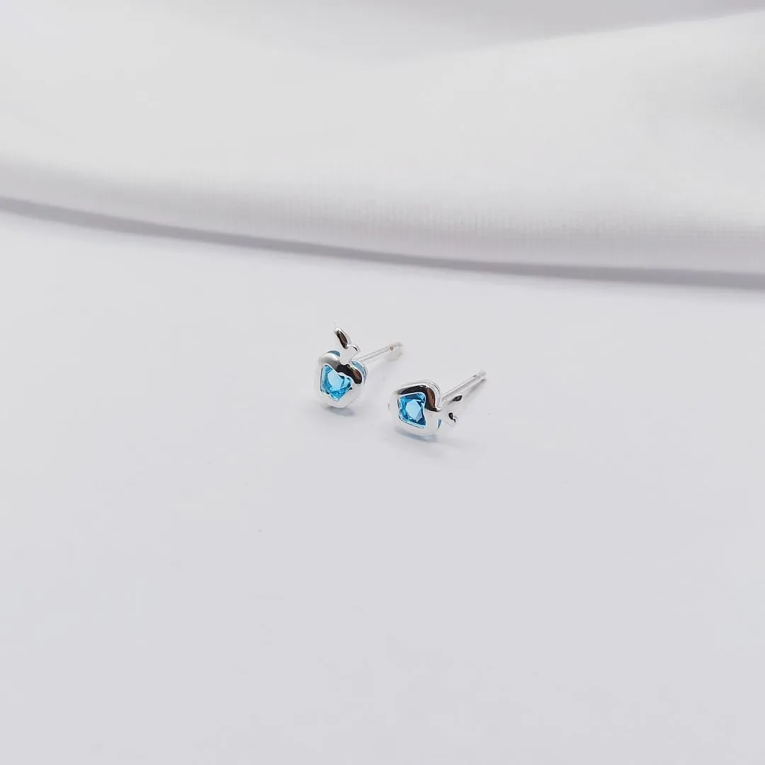 BRINCO PRATA MAÇÃ EM ZIRCÔNIA AZUL