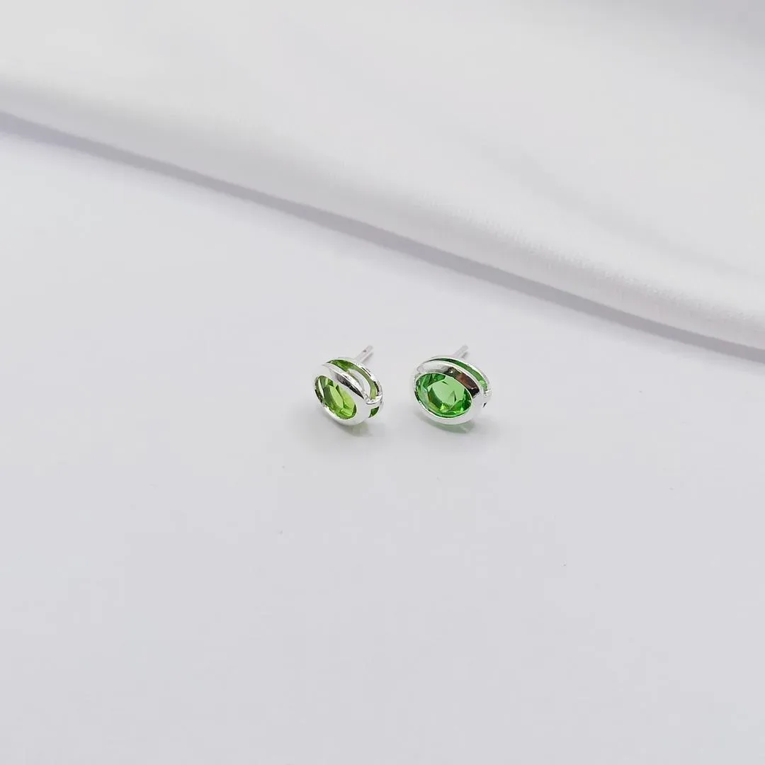 BRINCO PRATA PONTO DE LUZ OVAL VERDE
