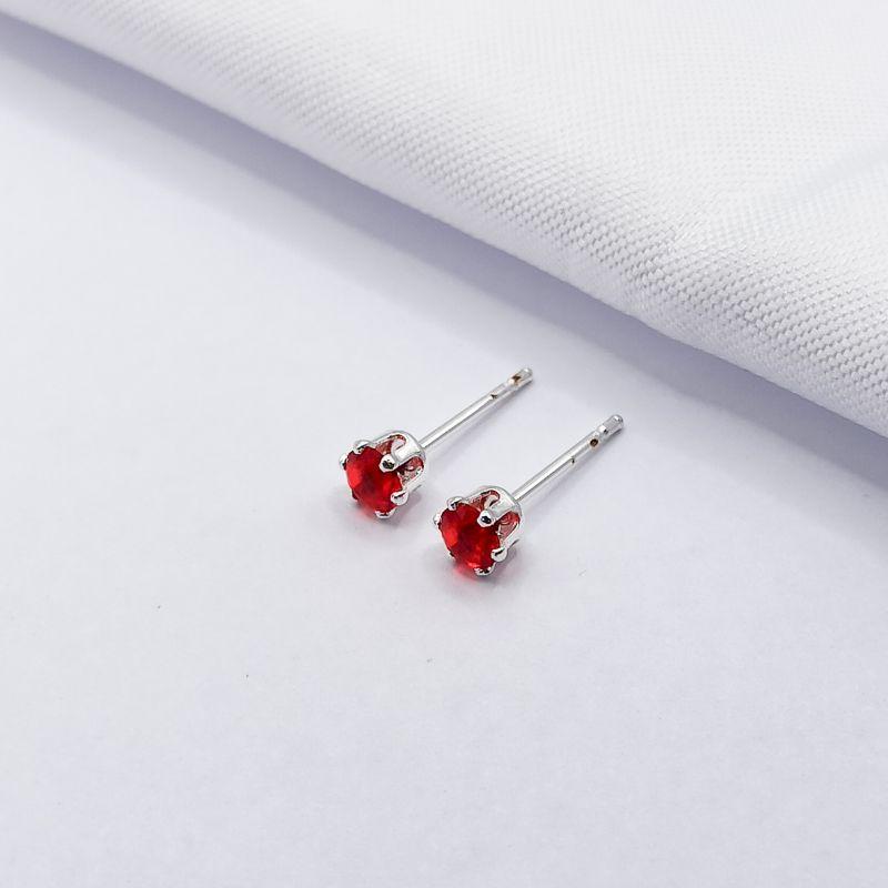 BRINCO PRATA PONTO DE LUZ VERMELHO M