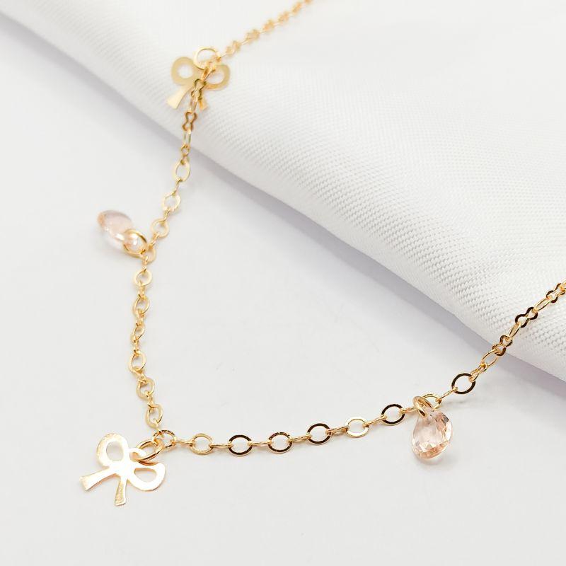 GARGANTILHA DOURADA CHOKER LAÇO E PONTO DE LUZ ROSA 40CM