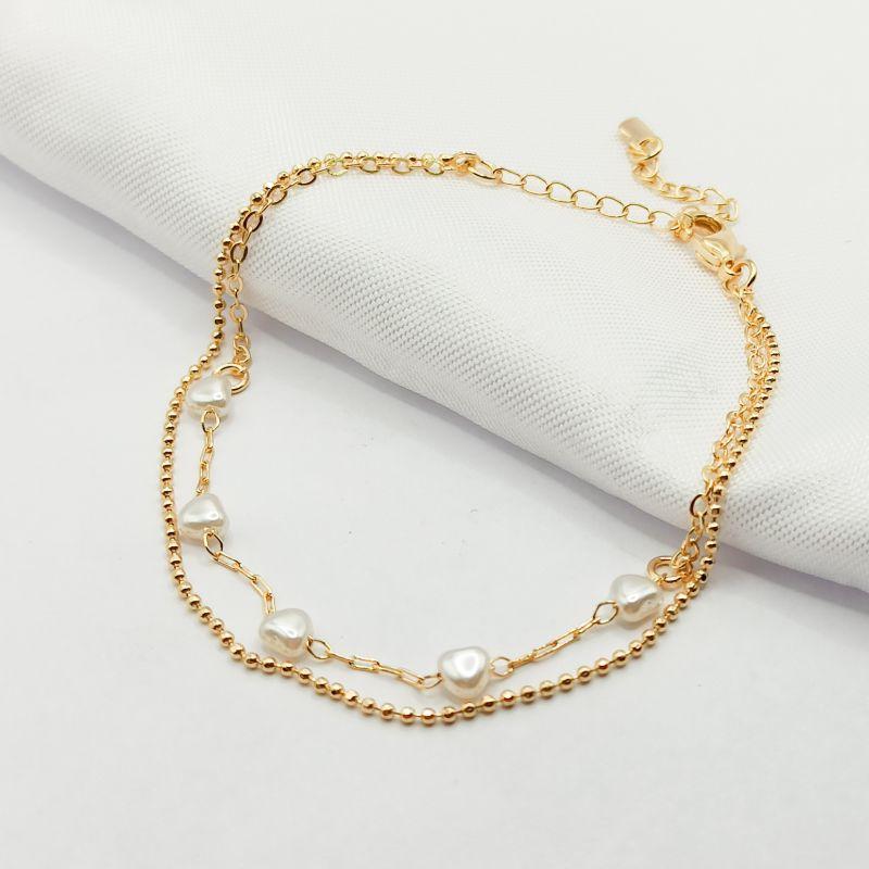 PULSEIRA DOURADA DUPLA BOLINHA E PÉROLA CORAÇÃO