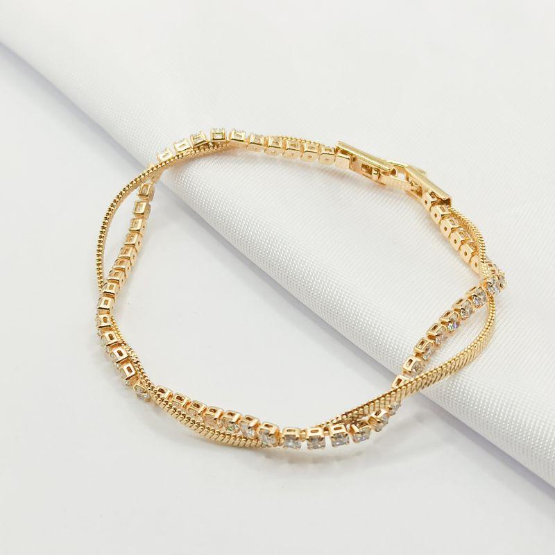 PULSEIRA DOURADA DUPLA RIVIERA CRISTAL E MALHA FITA ENTRELAÇADAS