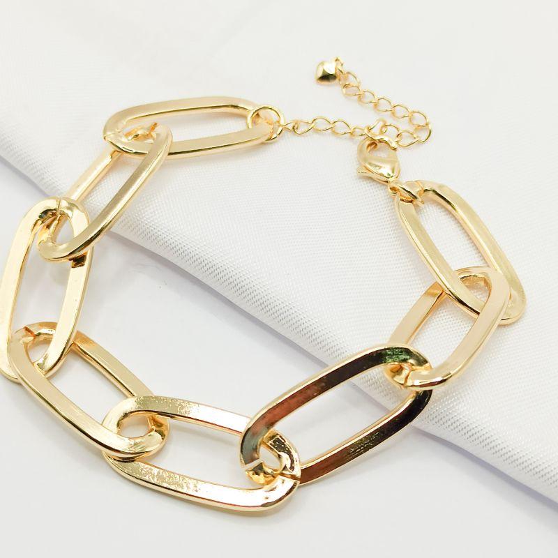 PULSEIRA DOURADA ELO CARTIER OVAL ALONGADO