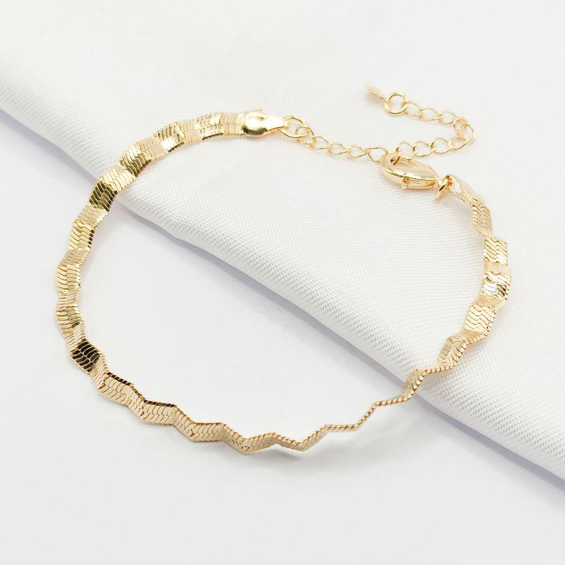 PULSEIRA DOURADA MALHA FITA ONDULADA