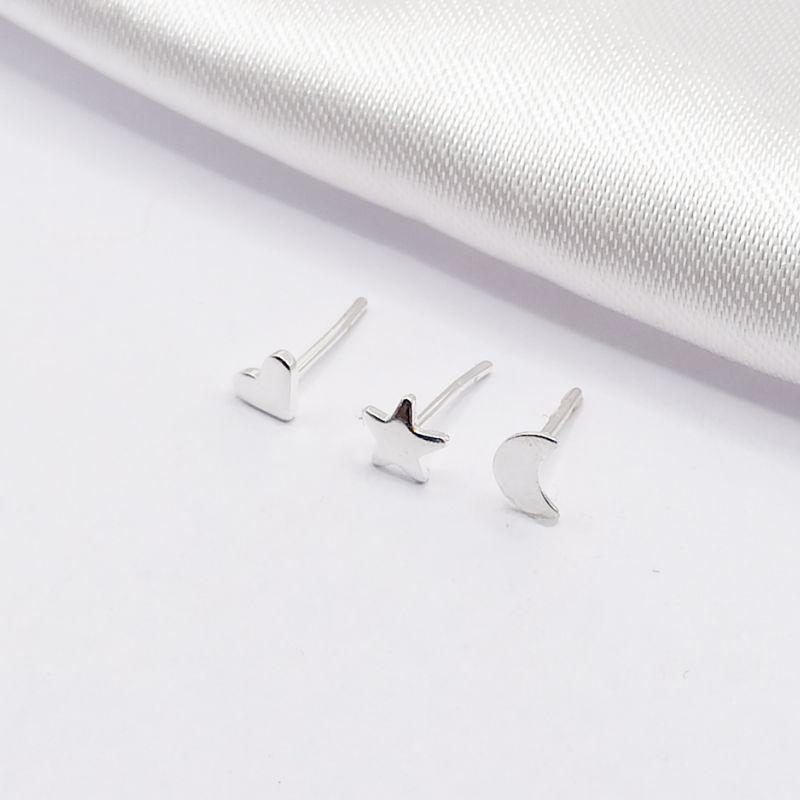 BRINCO PRATA TRIO CORAÇÃO ESTRELA E LUA CHAPA