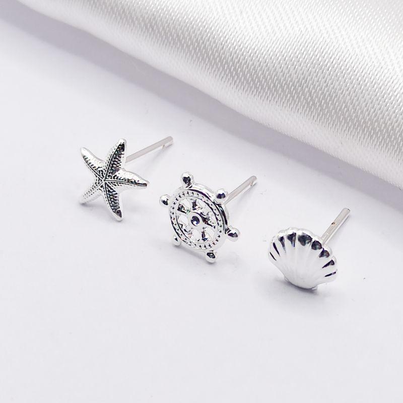 BRINCO PRATA TRIO ESTRELA LEME E CONCHA