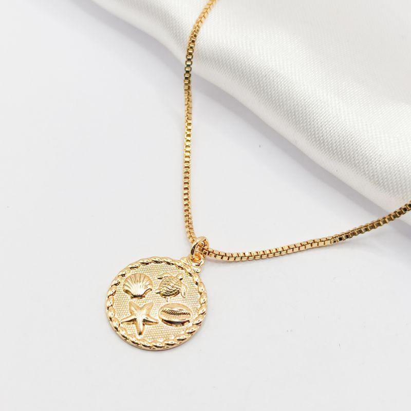 COLAR DOURADO MEDALHA CONCHA TRATARUGA BÚZIOS E ESTRELA 45CM