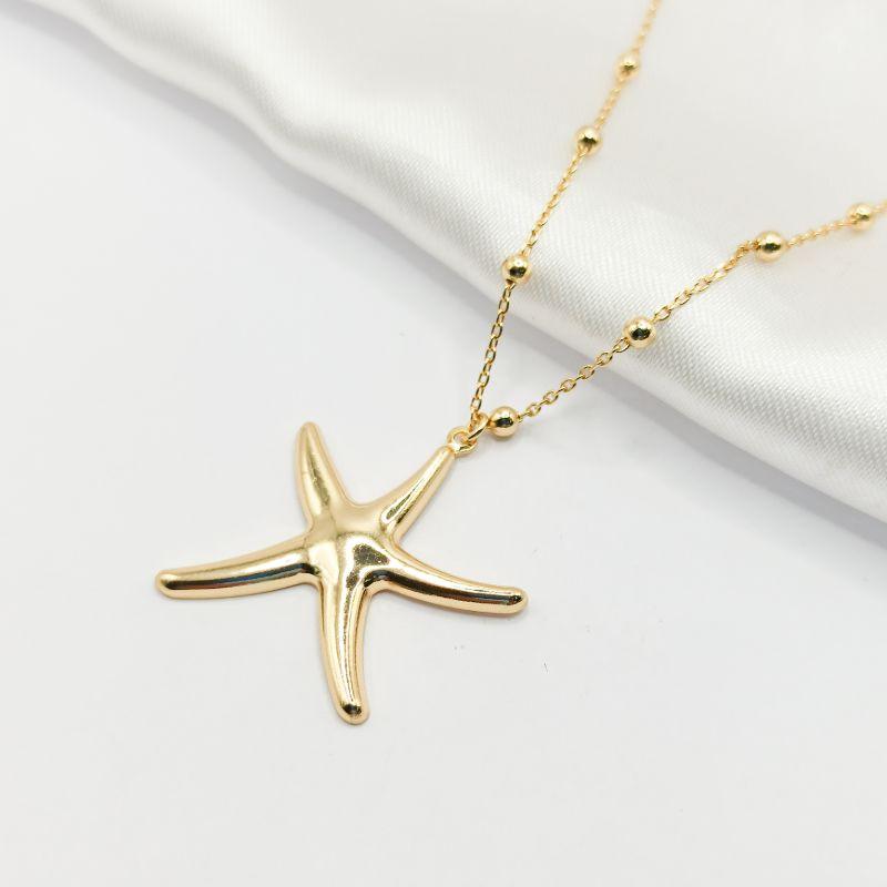 COLAR DOURADO CORRENTE BOLINHA E ESTRELA DO MAR LISA 45CM