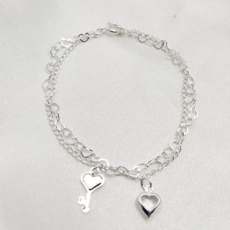 PULSEIRA PRATA CORRENTE DUPLA COM CORAÇÃO CRISTAL E CHAVE